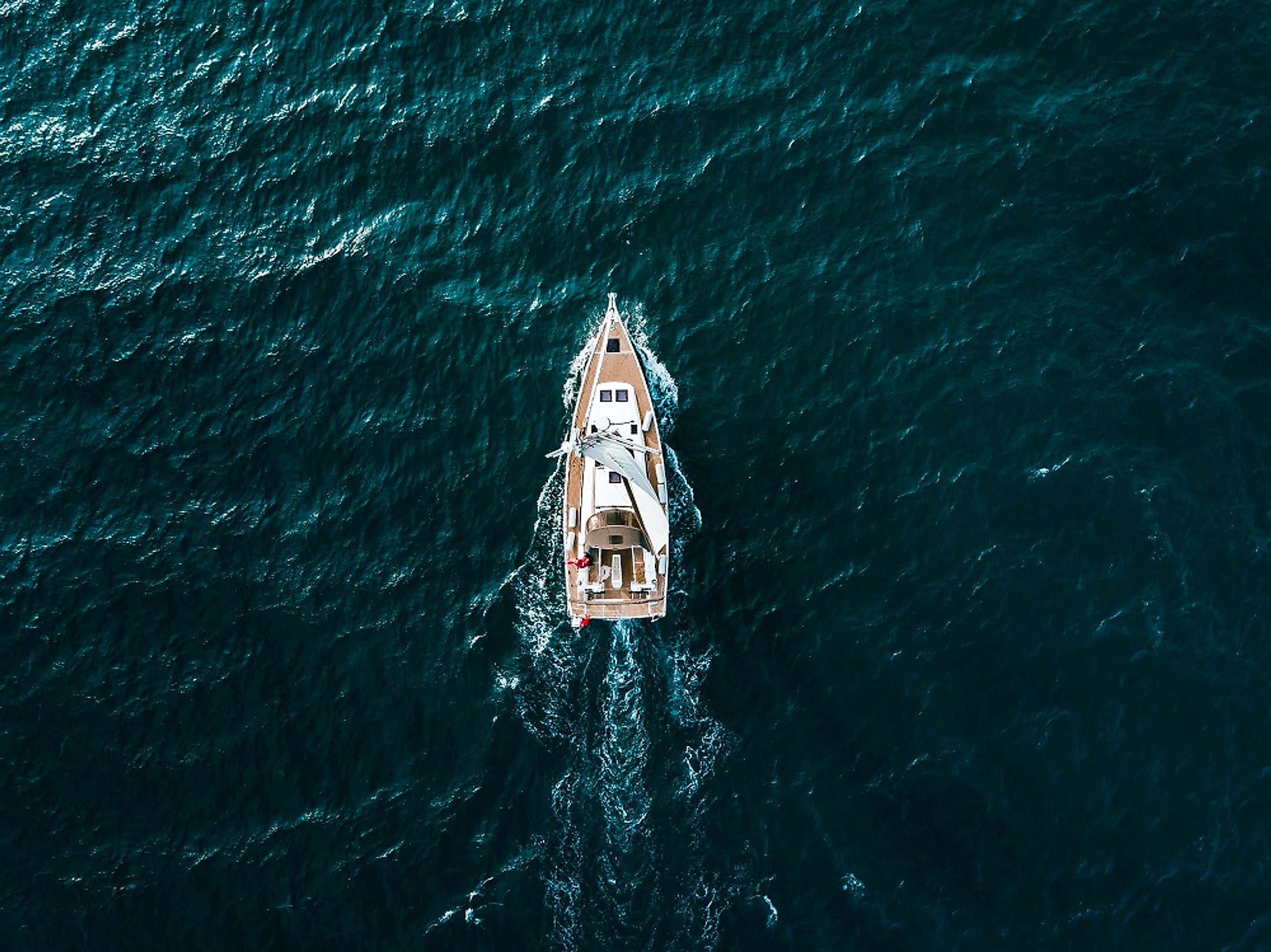 A yacht charting a course across open water